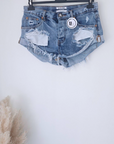 Short destroy en denim