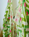 Robe verte dos nu en soie