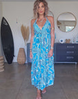 Robe bleue dos nu en soie
