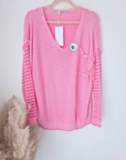 Pull ajouré rose