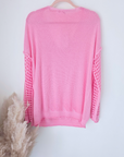 Pull ajouré rose
