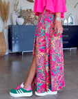 Jupe fuchsia fendue