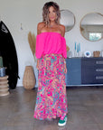Jupe fuchsia fendue