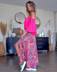 Blouse fuchsia épaules dénudées