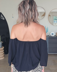 Blouse noire épaules dénudées