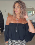 Blouse noire épaules dénudées