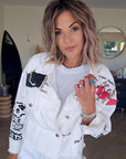 Veste rock blanche à tags