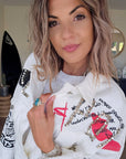 Veste rock blanche à tags