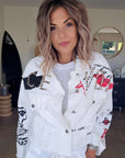 Veste rock blanche à tags