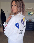 Veste rock blanche à tags