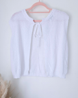 Pull blanc dos ouvert