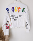 Veste rock blanche à tags