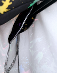 Veste noire tags fluo