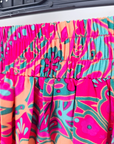 Jupe fuchsia fendue