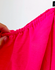 Blouse fuchsia épaules dénudées