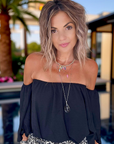 Blouse noire épaules dénudées