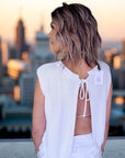 Pull blanc dos ouvert