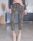 Pantalon jeeging léopard kaki