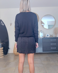 Pull noir éclairs strass