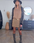 Ceinture élastique beige à boucle dorée