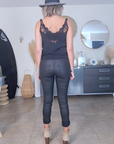 Pantalon slim noir huilé
