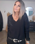 Pull noir éclairs strass