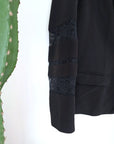 Veste noire à manches ajourées - 𝐌𝐚𝐫𝐢𝐧𝐚𝟒𝟒𝐟𝐚𝐦𝐢𝐥𝐲