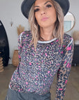 Pull léopard rose vif