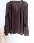 Chemise marron à volants
