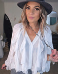 Chemise blanche à volants