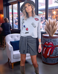 Pull gris écussons