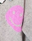 Pull beige smiley rose
