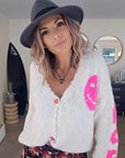 Cardigan smiley fuchsia