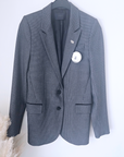 Veste chic noire & grise avec pin's