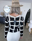 Pull ajouré noir et écru