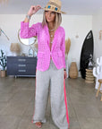Veste rose ajourée