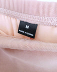Jupe beige rosé asymétrique