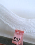 Cardigan blanc à encolure en V profonde