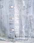 Veste en jean entièrement customisée