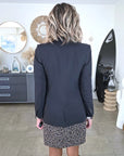 Blazer noir à épaulettes en cuir et clouté