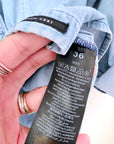 Chemise en denim bleu délavé