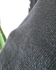 Pull noir à maille fine dos à strass
