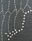 Pull noir à maille fine dos à strass