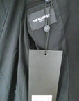 Blazer noir à épaulettes en cuir et clouté