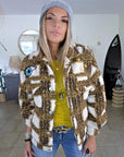 Manteau teddy bouclette à tags