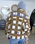 Manteau teddy bouclette à tags
