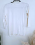 Cardigan blanc à encolure en V profonde