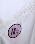 Débardeur blanc à bordures en dentelle