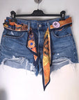 Short bleu destroy Levi's + ceinture tissu