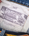 Short bleu destroy Levi's + ceinture tissu
